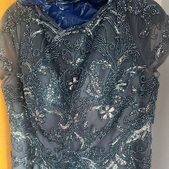 Gunmetal gray long formal. No alterations done. No smoking environment. - Picture 1 of 5